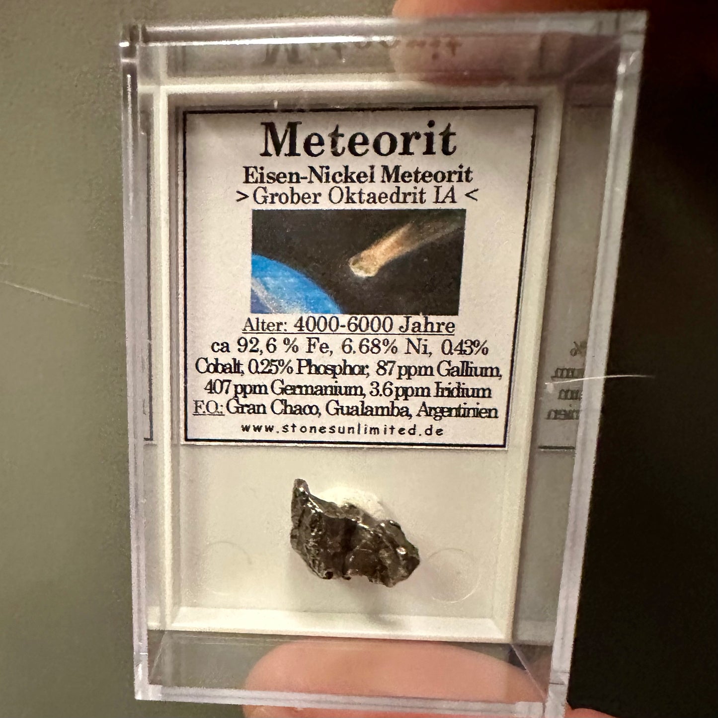 Iron-nickel meteorite in small box